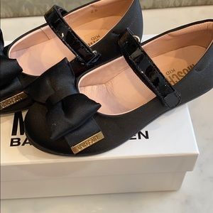 Moschino black toddler dress shoes.